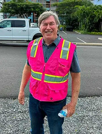Portrait of The Window Specialist installer wearing safety vest on a job site